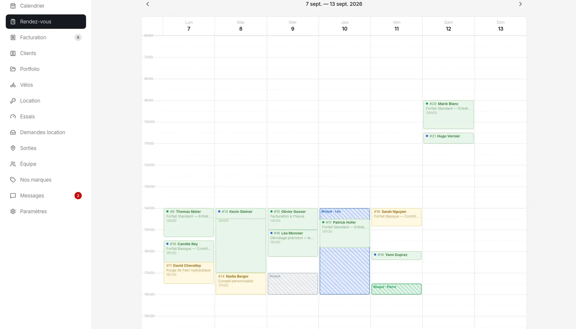 The week planner: one colour per mechanic, blocked slots hatched, parked jobs in the stand-by tray.